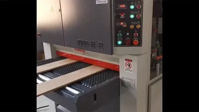 Широколенточный шлифовальный станок